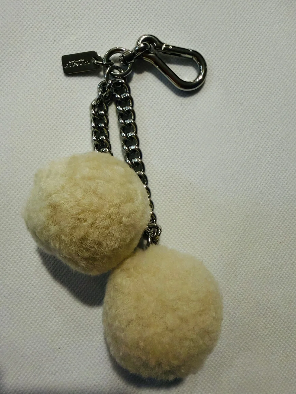 Coach Cream Pom Pom Keychain with Silver Chain